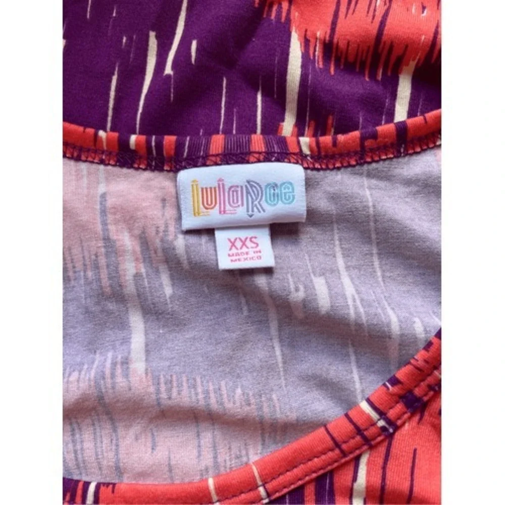 LuLaRoe Carly Swing Dress XXS Ikat Abstract Coral Purple High Low Pocket Stretch